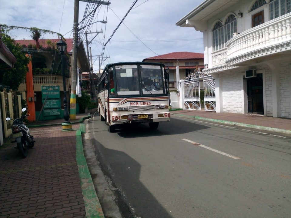 NCR Rienton Line bus passing the road of Mauban, Quezon.